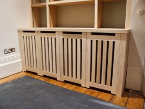 Custom made fitted bookcases and cupboards