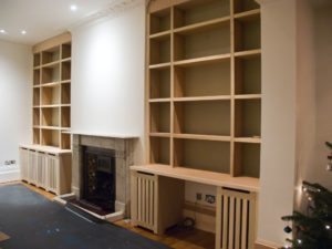 Custom made fitted bookcases and cupboards
