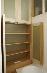 Custom made bathroom storage in Tulipwood