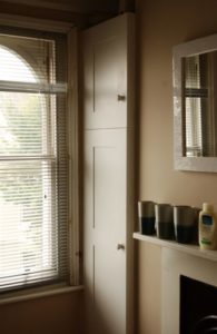 Small cupboards built into alcove