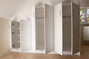 Wardrobe fitted into sloping ceiling