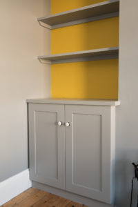 Cupboards fitted into alcove