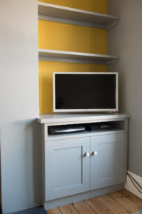 Cupboards fitted into alcove